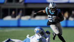 Panthers Put on Rushing Clinic in 37-23 Win Over Lions